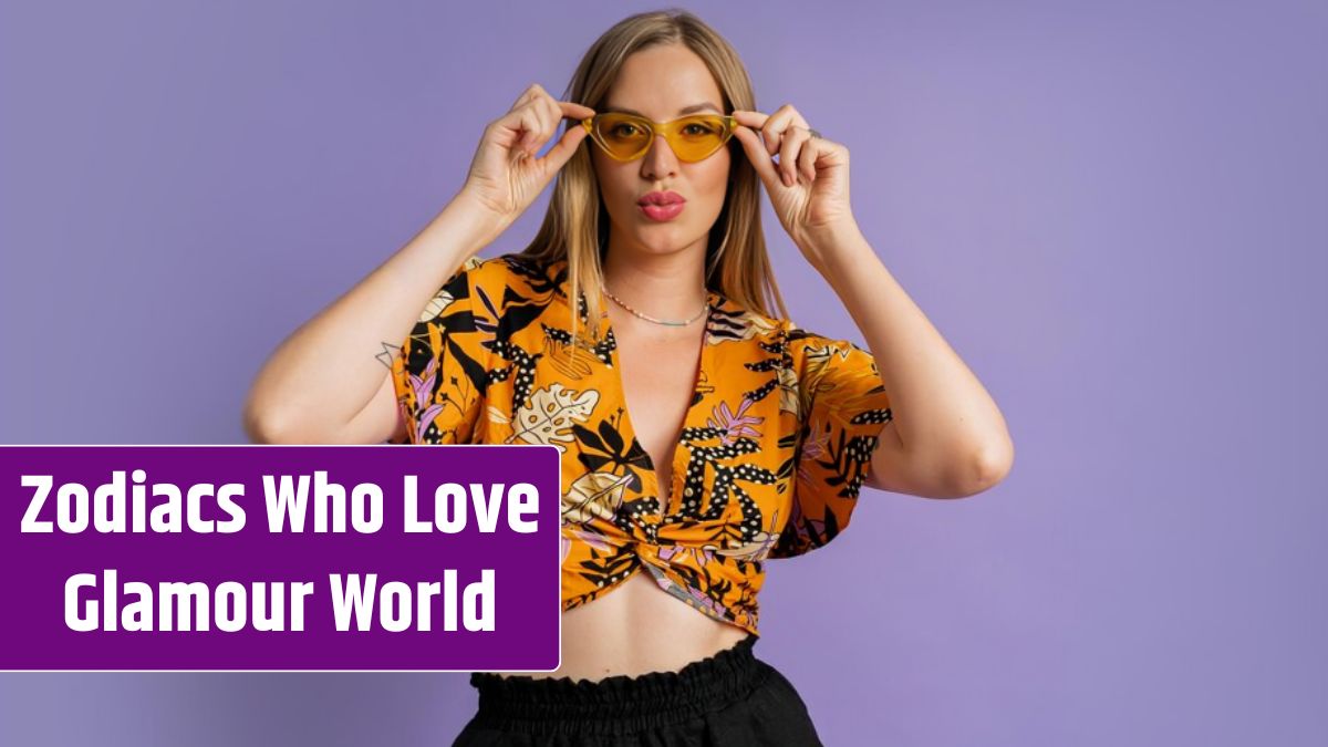 Studio fashion photo of pretty blond woman in stylish top and linen shorts posing on purple background.